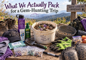 Gem-hunting trip packing gear including buckets, gloves, knee pads, boots, sifter, water, snacks and labeled bags for finds